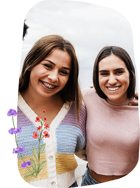 Two young women smiling