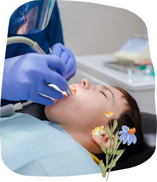 Child receiving a dental treatment